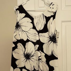 Talbots Petites- NWOT. Cream sleeveless blouse w/ black flowers & bow shoulder.